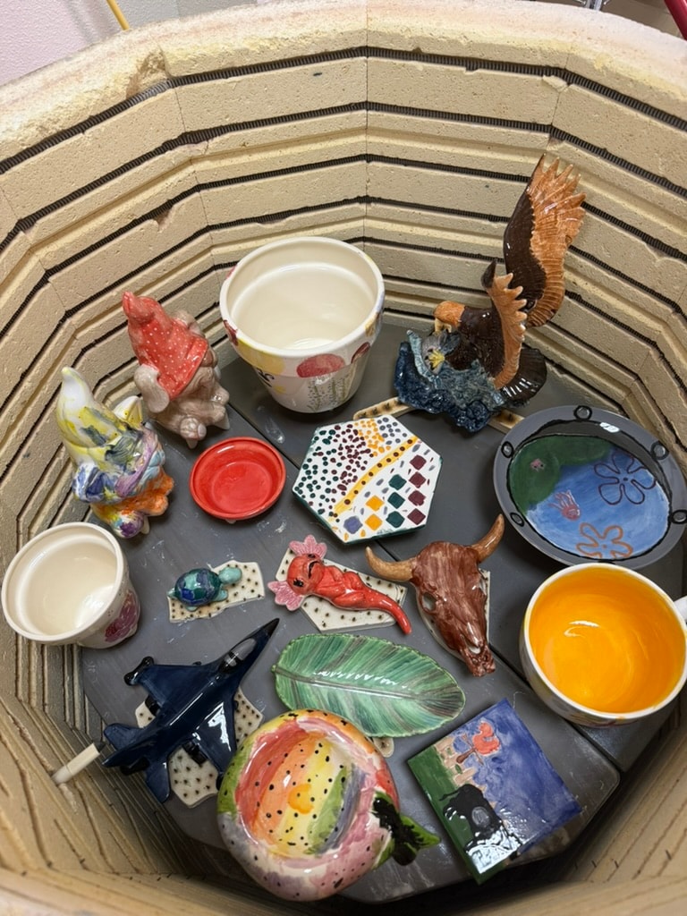 Colorful craft supplies arranged in circular baskets