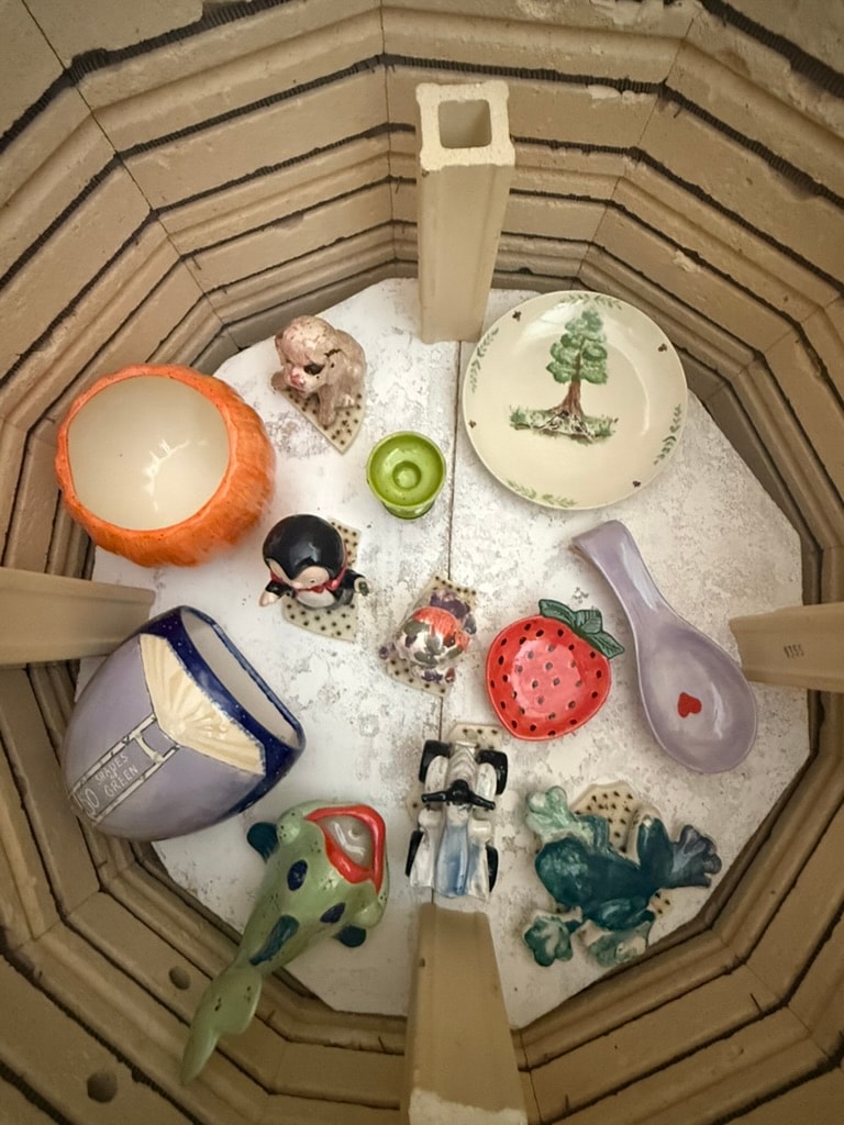 Overhead view of ceramic dishes and toys