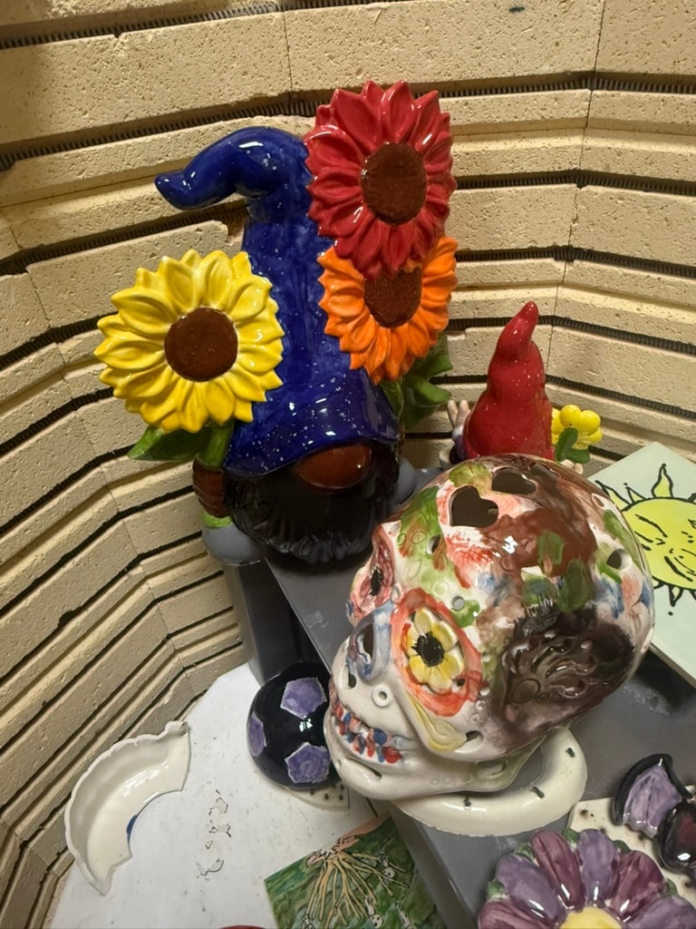 Colorful ceramic gnome with flower hat